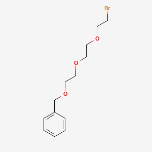 ((2-(2-(2-Bromoethoxy)ethoxy)ethoxy)methyl)benzene