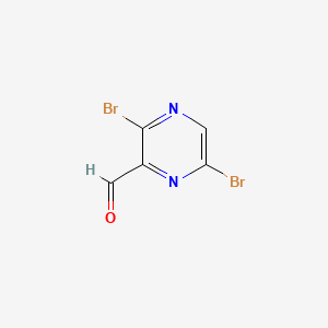 3,6-Dibromopyrazine-2-carbaldehyde